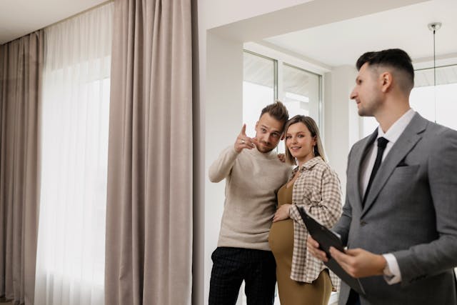 two-people-attending-a-property-showing-with-a-landlord